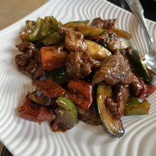 a plate of stir fried vegetables