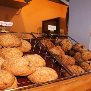 a variety of cookies on a cooling rack