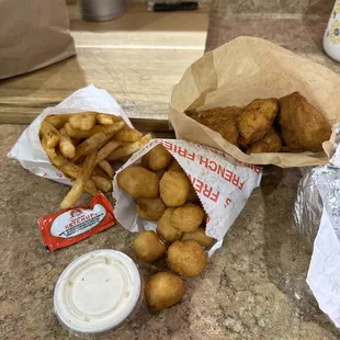 Fries, cheese curds, and chicken tenders