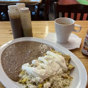 Chilaquiles Verdes with extra creamy frijoles substituted for potatoes
