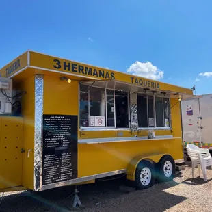 a yellow food truck