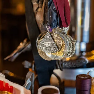 a medal hanging from a bar