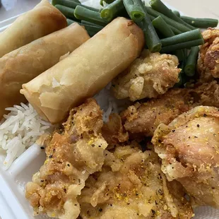 Lunch special: Lemon pepper chicken with white rice and 3 egg rolls. Added green beans from home.