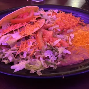 Tacos dorados with rice and beans