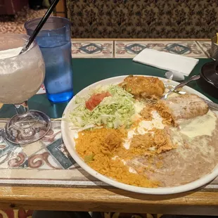 Piña Colada; combination plate: Chicken Chimichanga with queso on top and Chili Rellano