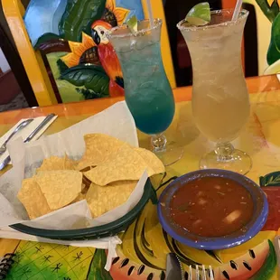 A blue margarita and a Cabo Wabo with some chips and salsa.