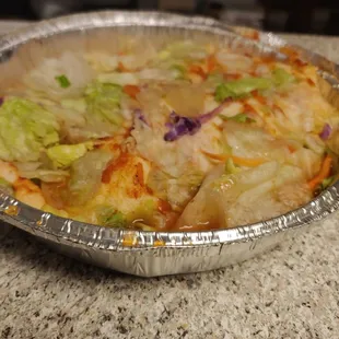 This makes no sense. Lettuce on top of a to-go burrito. Soft and not at all appetizing.