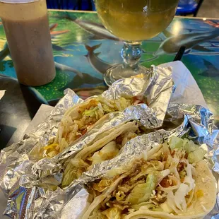 Three tacos: One smoked pork, one grilled fish, and one grilled shrimp...so good!