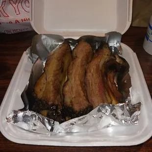 pork in a styrofoam container