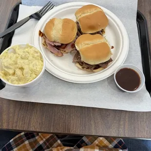 Sliders(brisket, pulled pork and ham), potato salad, and their hot bbq sauce.