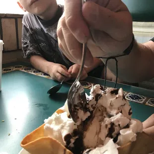a child eating a desert