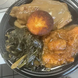 Smothered Pork Chop, Yams, Collards, and Corn Muffin