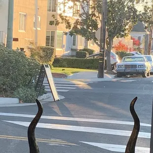 a view of a street through a window