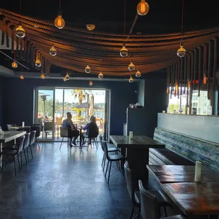 a restaurant with tables and chairs