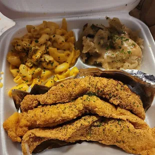 Fried fish, mac and cheese and potato salad