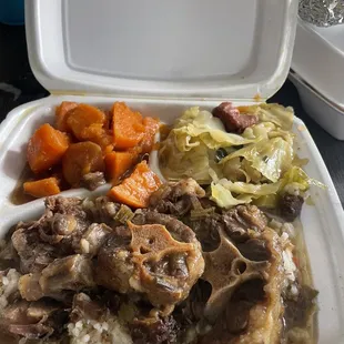 Oxtail plate with yams and cabbage