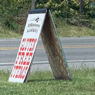 a sign on the side of the road