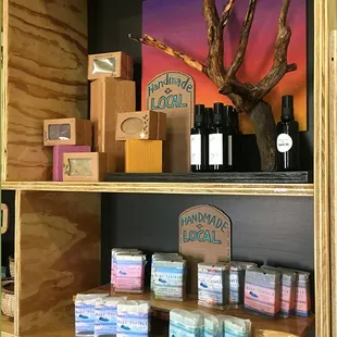 a shelf with soaps and soap bars