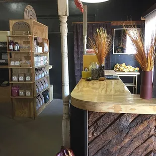 a wooden counter and shelves