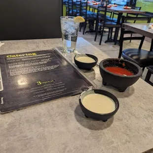 Complimentary cheese dip and salsa