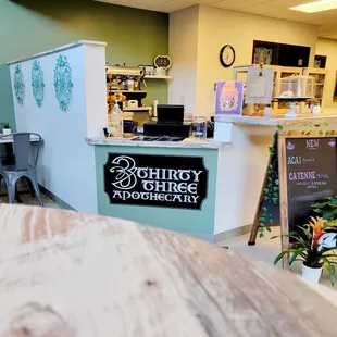 a counter with a laptop on it