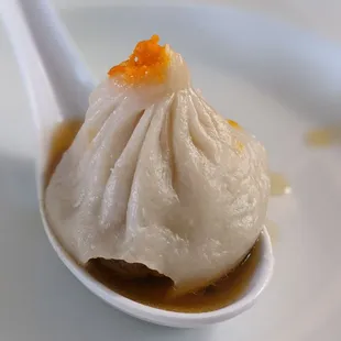 Home steamed frozen soup dumpling with crab roe