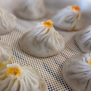 Home steamed frozen soup dumpling with crab roe