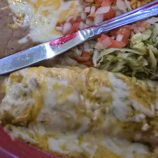 Butter knife next to the burrito for scale. This thing was tiny.