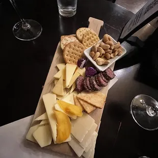 a platter of cheese and crackers