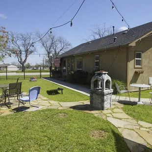 The patio is the perfect setting for a friendly game of cornhole or relaxing with your wine while listening to music.