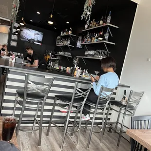 a man sitting at a bar