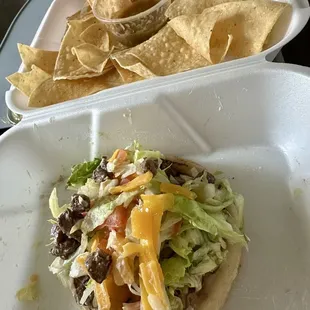 Sope de asada with chip &amp; green house salsa. Perfect