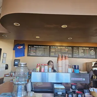 a woman behind the counter