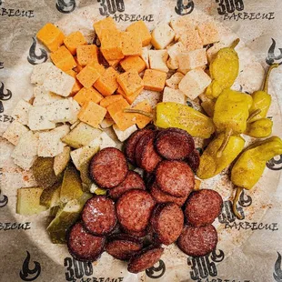 Smoked linkn sausage, dill pickle, pepperoncini peppers, cheddar, pepper jack, swiss