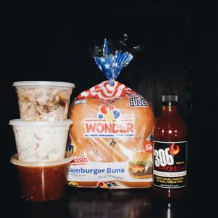 Pick up a "306 Pack" for a tasty tailgate spread! 

1 lb of meat w/2 pint sides,
8 pk. of buns, and sauce
Pork / Turkey / Ham