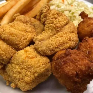 Enjoy Fried Fish Friday, Sat, and Sun while supplies last!
- 5 strips of fish battered in cornmeal dredge
- 3 hush puppies
- Two sides