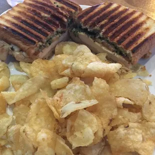 Chicken pesto panini sandwich and kettle chips