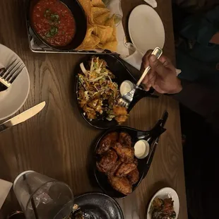 queso and salsa, buffalo cauliflower, wings, brussels sprouts