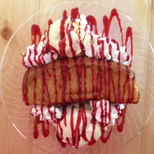 The Best Dessert You've Never Had  --  deep fried sweet roll served with ice cream and your choice of sauce. It will make your day!