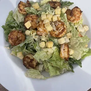 Caesar salad w/shrimp was amazing !!! Large portion and very tasty the shrimps were flavorful high recommend will not disappoint