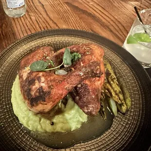 Sam&apos;s rotisserie chicken with mashed potatoes and asparagus.
