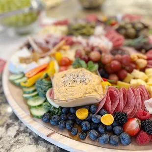 a platter of fruit and vegetables