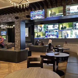 Lots of sofa, chairs, and TVs!