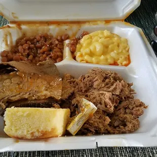 2 meat platter with Brisket, Pulled Pork, Mac and cheese, baked beans, and corn bread. Sauces on the side