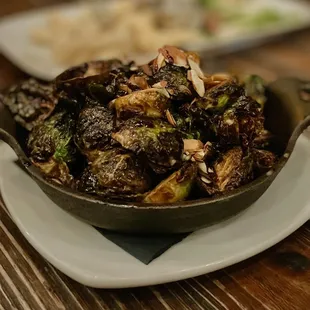 a bowl of brussel sprouts on a plate