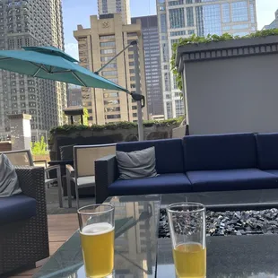 two glasses of beer on a table