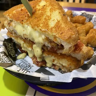 Fondue You Love Me - crispy fried buttermilk chicken, marinara, and mozzarella fondue on parmesan-crusted bread