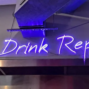 eat drink repeat neon sign