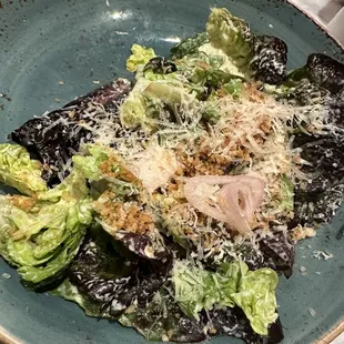 a plate of salad on a table