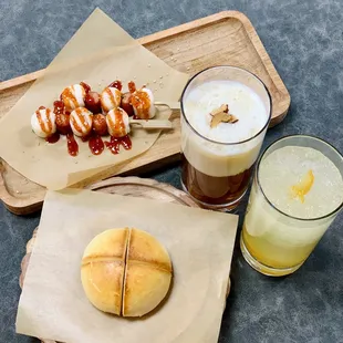 a plate of food and a glass of beer
